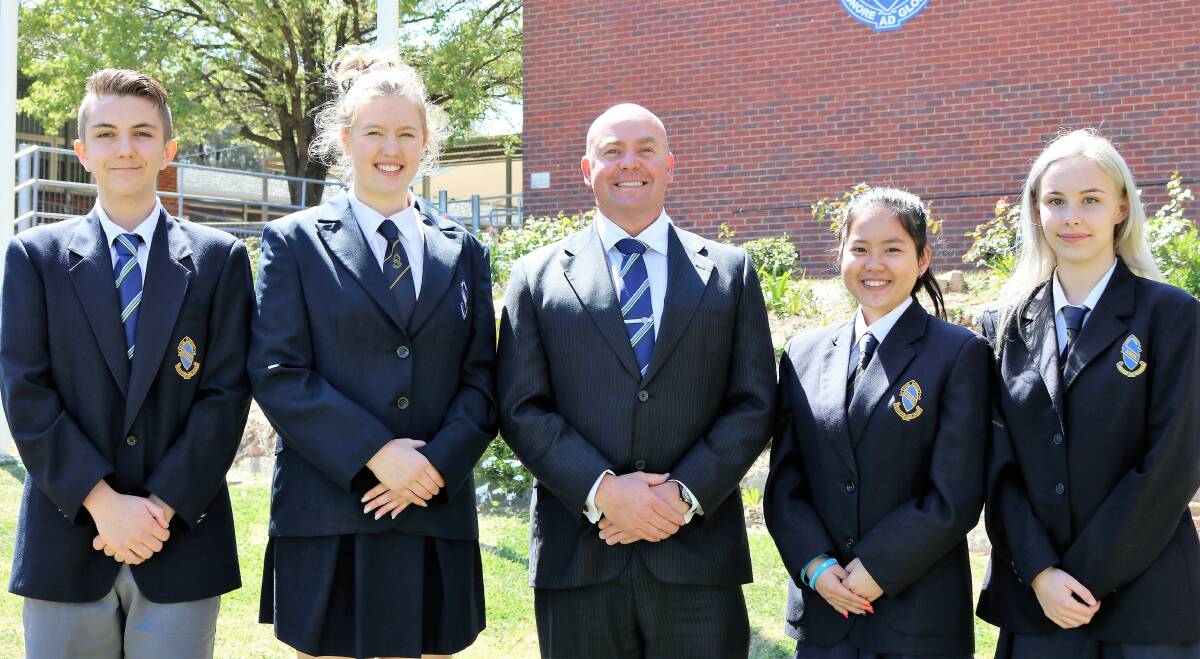 LEADERS: Junee High School captains (from left) Harrison Fahy and Mae-Rose Harrison, principal Scott Frazier and vice captains Donna Nguyen Luu and Charlotte Field.