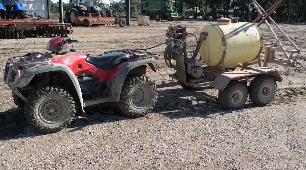 ONE item available at the clearance sale, a 2011 Honda Foreman TRX500FMB 4WD quad bike, with Hardi tow-behind boom spray and 5.5hp Honda motor.