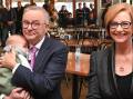 Anthony Albanese holds little baby Charlie as he shares a coffee with former prime minister Julia Gillard at the Sfizio cafe in the seat of Sturt in Adelaide. Picture: AAP
