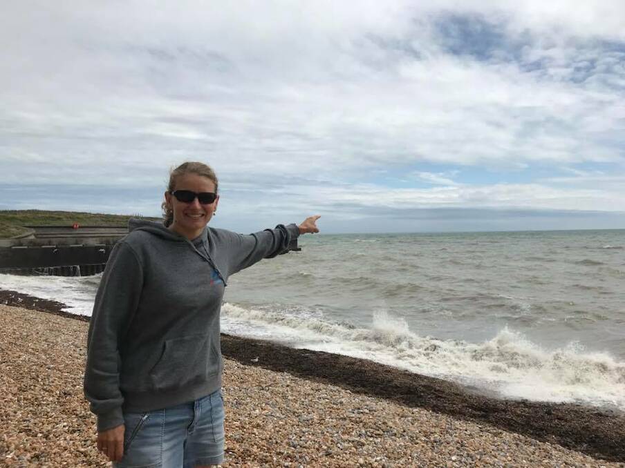 EYE SPY: Brenda Norman points out the French coastline from the Dover shore ahead of her English Channel swim. Picture: supplied