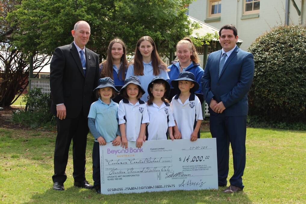 FINE FUNDING: Kindergarten students Paige Dillon 6, Lily Lagan 5, Isabelle Brabander 6, and Royce Gillett 6, with Madeline Cutler 14, Claire Wiltshire 16, and Monique Kitchener, acting principal Kingsley Ireland and head teacher wellbeing Joshua Celi.
