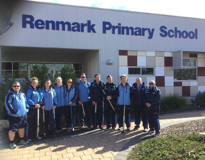 The undefeated NSW men's team conduct an early morning hockey clinic at Renmark Primary School, South Australia. Picture: supplied