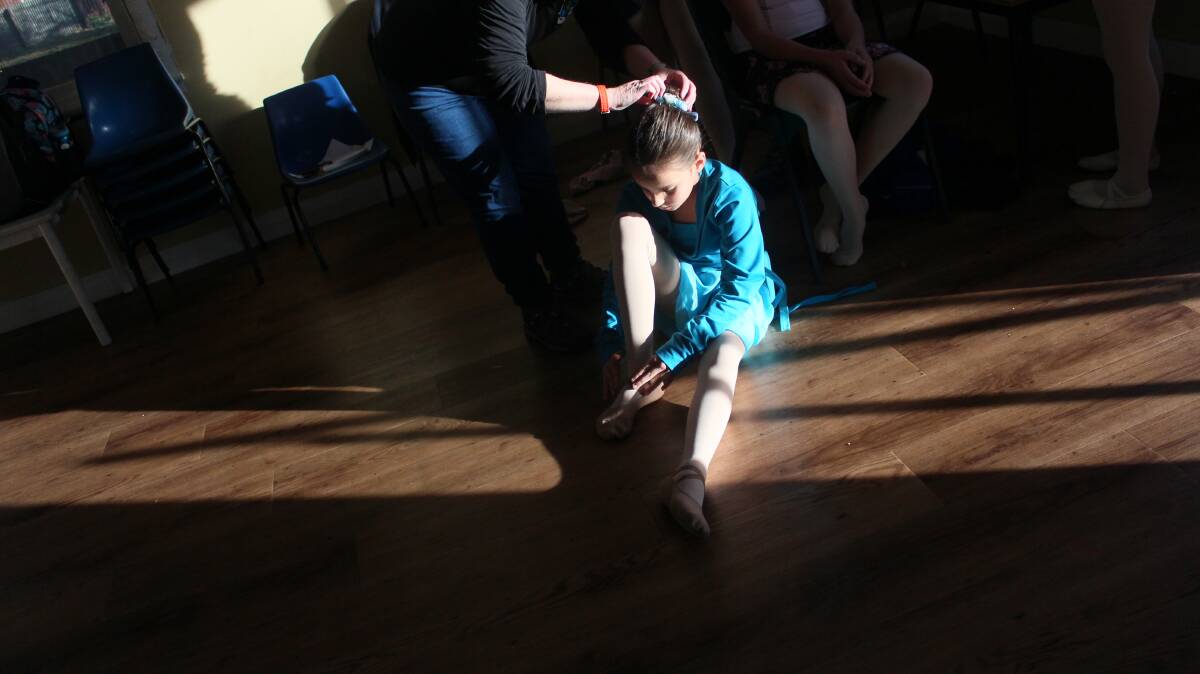 PREPARATION: Isabella aged 9, gets ready to begin her dance lesson. Picture: Emma Horn