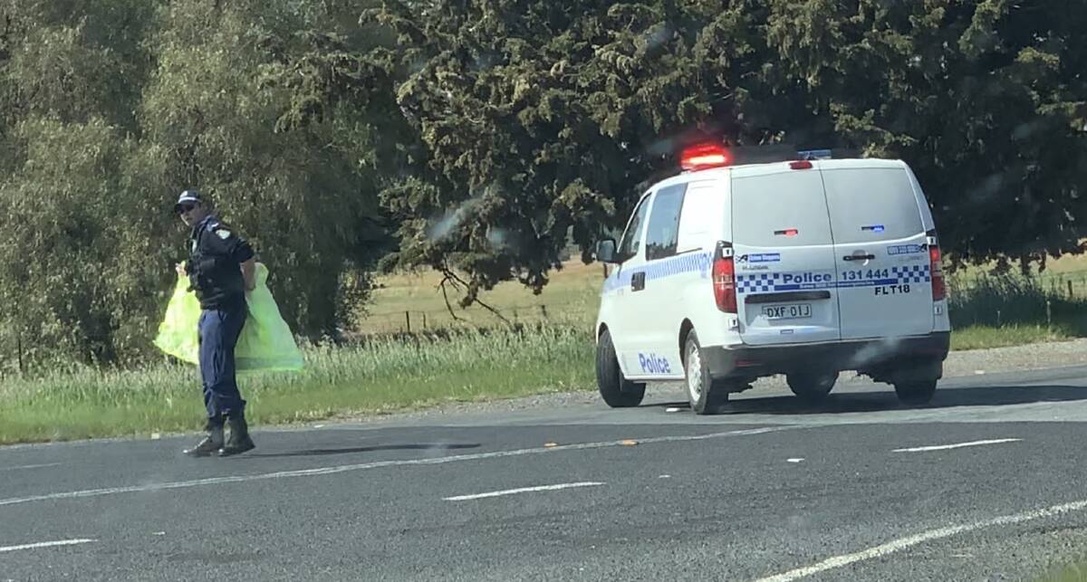 TRAGEDY: NSW Police near the crash scene in Old Junee on Saturday. Picture: Jaydan Duck