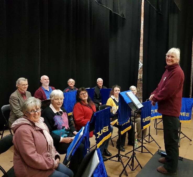 HIGH NOTE: The Junee Community Choir rehearsing in the Athenium Theatre ahead of this Friday's performance. Picture: Judy Emberson