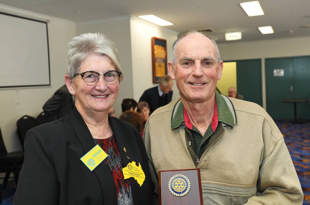 A YEAR TO REMEMBER: Outgoing president Trish Davies with community service award recipient Brian Beasley. Picture: Junee Southern Cross