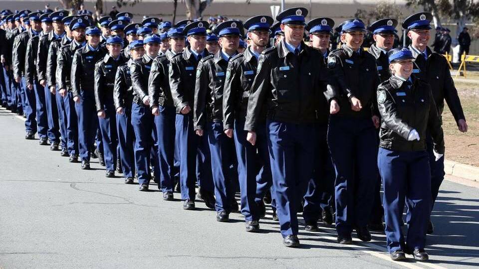 OUT OF THE BLUE: Graduating class 334 march out of Goulburn Police Academy during a ceremony in August 2018. Picture: NSW Police Force