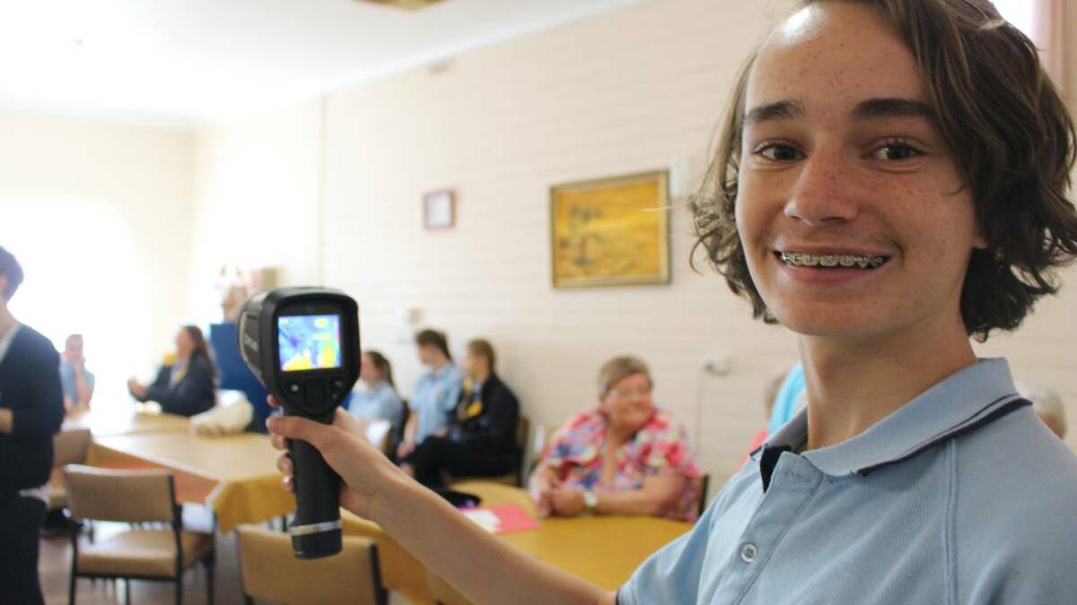 Junee High School students help the town's senior citizens find ways to improve their energy consumption.