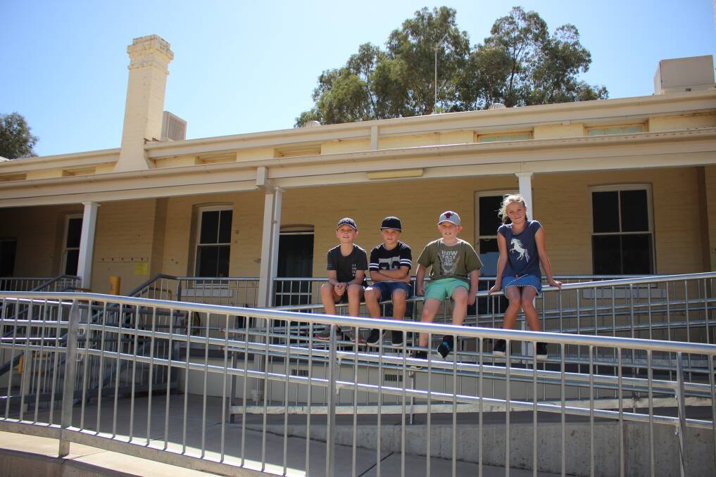 VACATION SCHOOL: 10-year-old Lincoln McAlister, 10-year-old Seth Wright, nine-year-old Harry Lynch and 11-year-old Alexa Wright at the newly reinstated out-of-hours school care at Junee Public School. Picture: Emma Horn