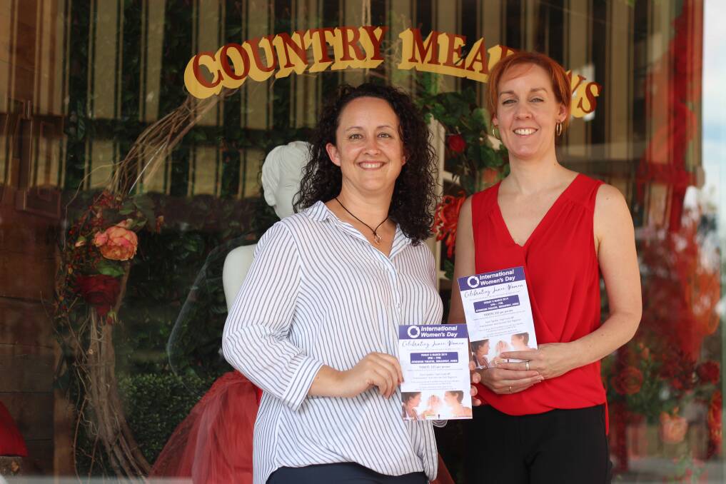 CELEBRATING WOMEN: Committee members Natalie Phillips and Alana Lesslie outside Country Meadows, where tickets are being sold.