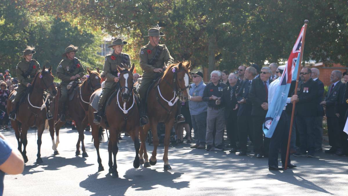 BACK TO WORK: The light horse brigade lead the procession down Broadway for the 2019 commemoration of Anzac Day. The event cost the Junee RSL sub-branch thousands of dollars, which dwindled reserves during the fundraising ban. Picture: Jessica McLaughlin