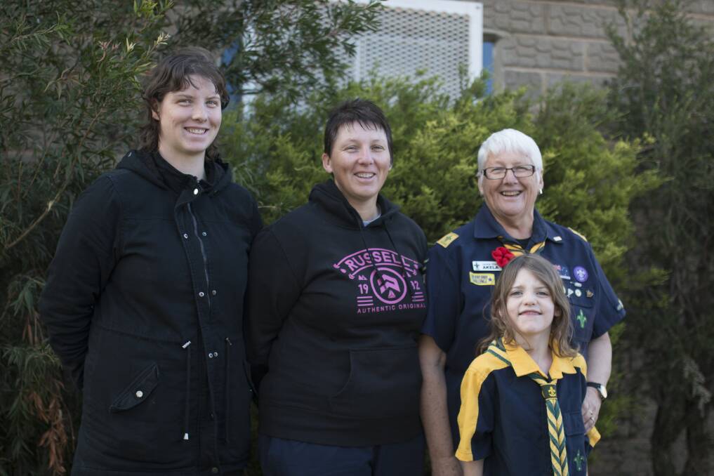 FAMILY HONOUR: Jackie Starr (far right) has been honoured with the Silver Wattle Award for her service to Junee 1st Scouts. Pictured with her great granddaughter, Annabelle Howarth, daughter Susan (middle) and grand-daughter Stephanie (far left), all of whom have been invested into the scouts program. Picture: Emma Horn.