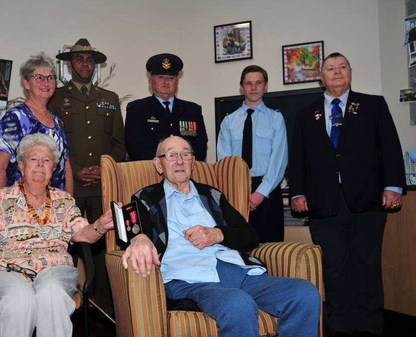 Roger Quine with wife Fay Quine, Rotary president Trish Davies, Major Roderick Narayan, squadron leader Peter Hogarth, grandson Tahi Davis and RSL welfare officer Ross Reid. Picture: Chelsea Sutton