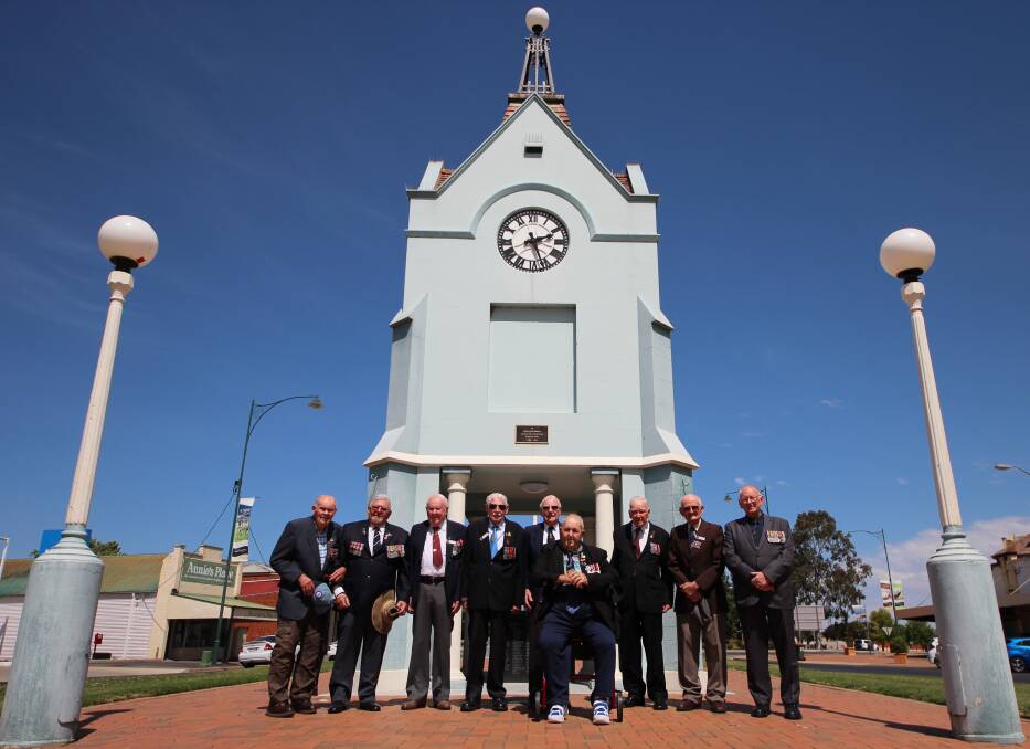 REMEMBRANCE: Mal Matheson, Joe Mercieca, Alan Bentley, Kevin Cordell, Harry Fennell, Bill Collins, Len Wolfe, Neville Taber and John Curtis at the Junee memorial cenotaph.