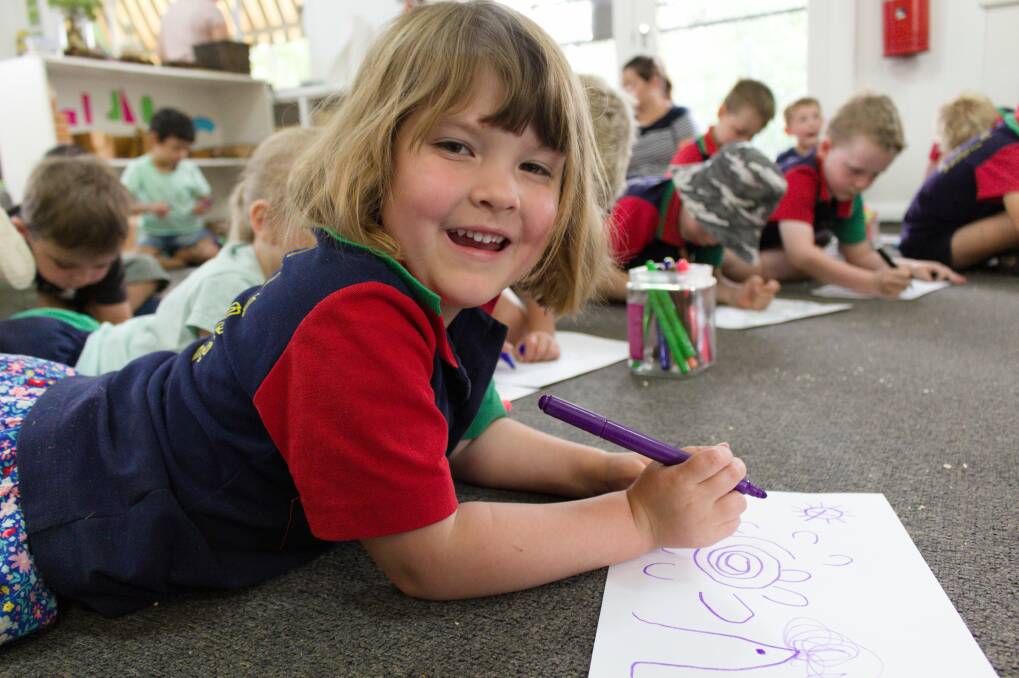 CULTURE EXPRESSION: Maycie McRae 4, draws her day in Wiradjuri art during lessons at Junee Memorial RSL Preschool. Picture: Emma Horn