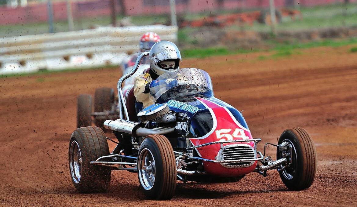 Sid Middlemas, now in his 80s, races a vintage speedcar at the Illabo Motorsports Park in 2017. Picture: Keith White