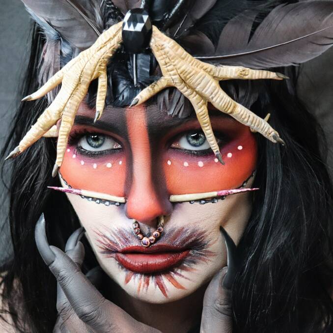 SELF-PORTRAIT: One of Katie Smallmon's avant garde fantasy artworks painted onto her own face. Picture: supplied