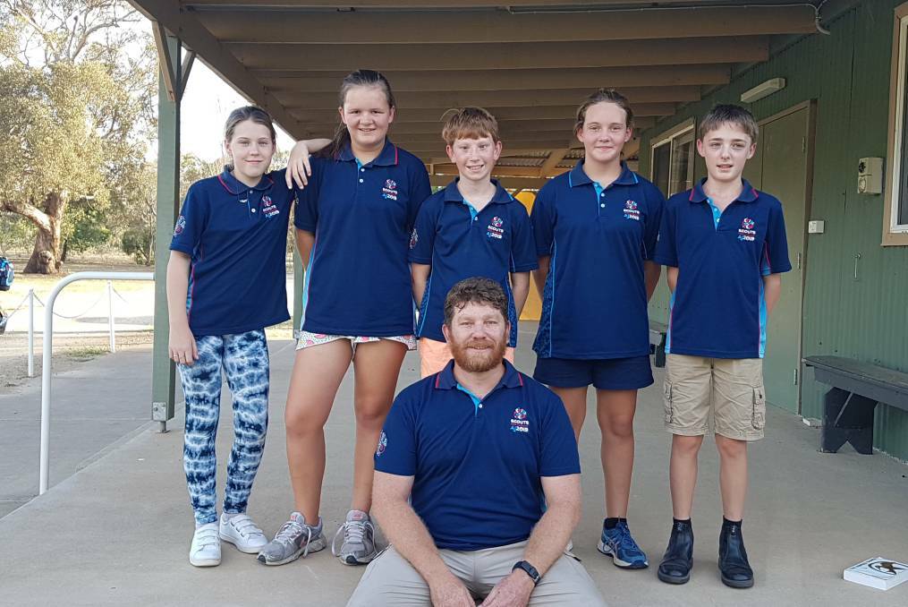 Daniel Wattie (front) with scouts (from left) Tiger-Lily Kemp, Caidance Reberger, Flynn Wattie, Jazmin Ross, Henry Stanyer.