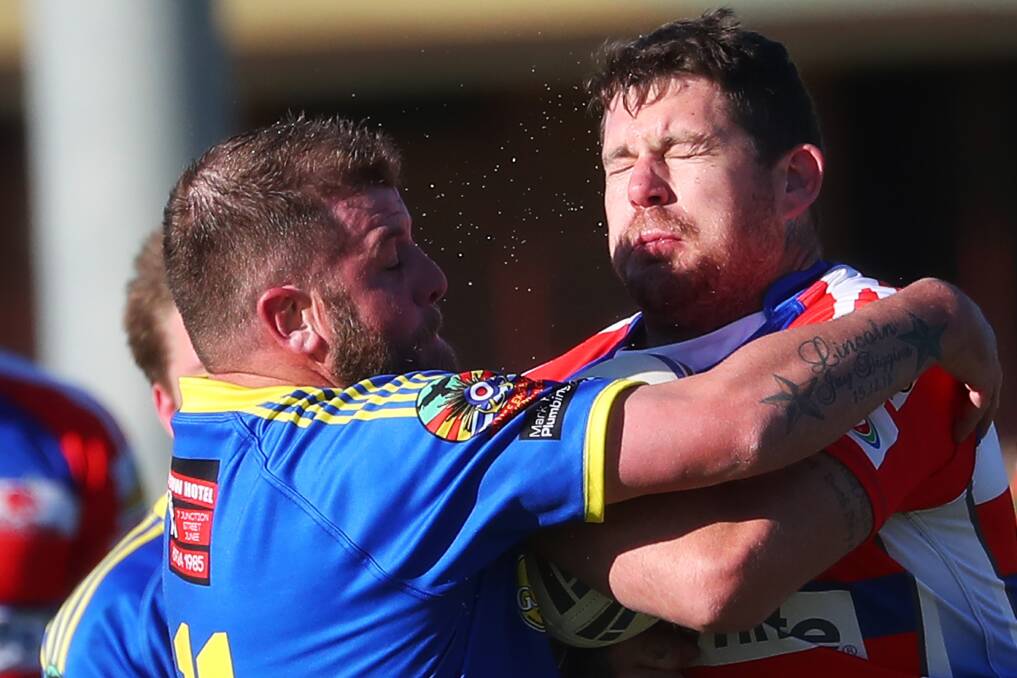 BIG CLASH: Tom Diggins comes in to tackle Young front rower Kyle Richens in Junee's tight win at Laurie Daley Oval on Saturday. Picture: Emma Hillier