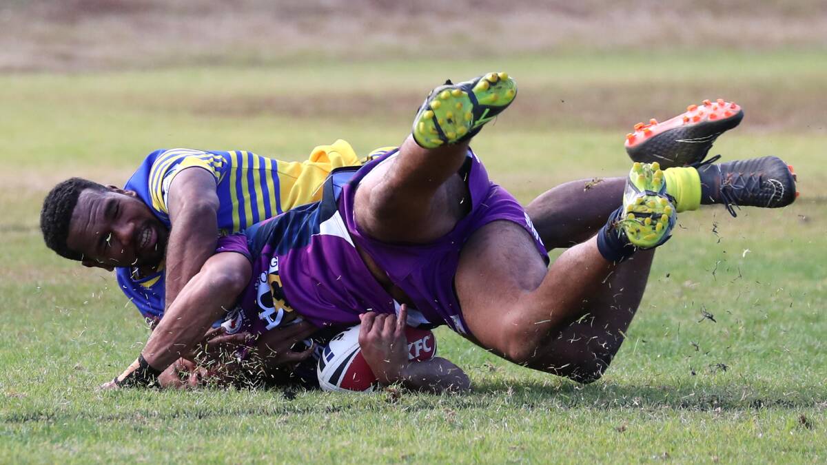 GOING DOWN: Timoci Vatubuli drags down an opponent during the Diesels 20-14 loss to Southcity on Sunday. Picture: Les Smith