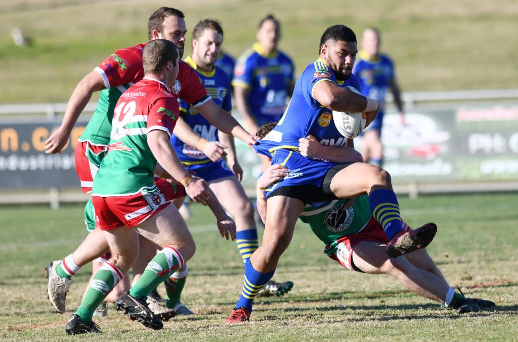 TOUGH TIMES: Simione Naiduki takes a hit-up for Junee during a Group Nine game last year but the impact of the coronavirus has raised concerns over the Diesels ability to compete in a 2020 season..