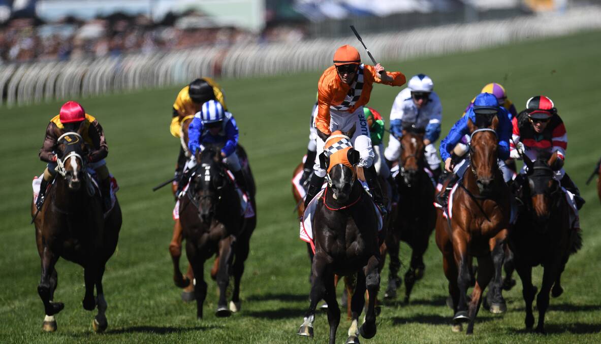OUT IN FRONT: Tye Angland and Ace High claim the time-honoured Victoria Derby at Flemington in November, capping a big spring for the boy from Wantabadgery. Picture: Fairfax Media