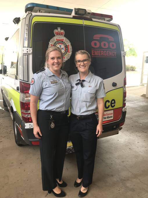 QAS officers Sarah Stone and Bianca Anderson in their dress uniforms