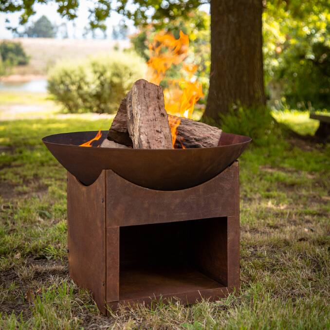 LIGHT MY FIRE: Glow's Tambo Fire Pit is perfect for both large spaces or compact areas where space is at a premium. Available at Bunnings Warehouse. 
