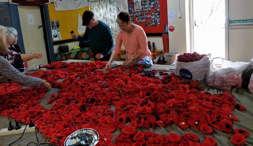 POPPY PROJECT: Over 3000 poppies have been knitted or crotcheted by the Junee Shire. Picture: Supplies 