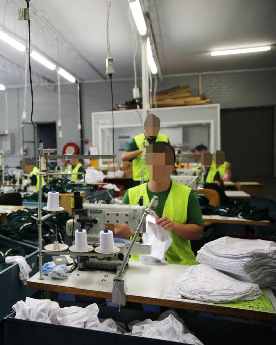 PRISON WORK: Inmates sew prison-issued underwear in the textiles unit at Cooma Correctional Centre. Picture: Supplied 