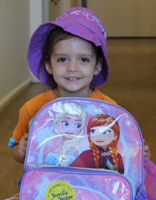 ALL SET: Grace Gilholme, 3, has her backpack and hat ready for a busy day at Goodstart Early Learning in Morgan Street.