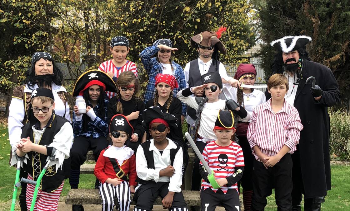 SEA OF THIEVES: Junee Public School students from kindergarten to grade six and Principal Ms Tracy Delaney (top-left) and Mr Tim Harris (top-right) became pirates for the day.  