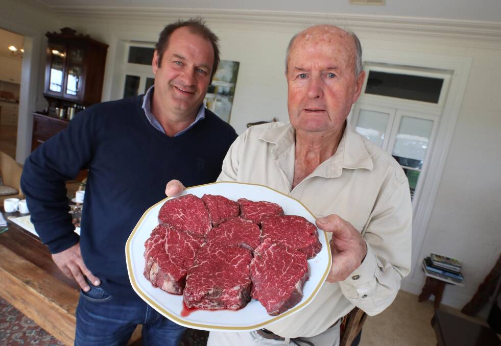 BEST MEAT: John Martin has won best "steak" in the world in an international competition. Pictured with (L) Jim Coe, owner of Dollar Vale feed lot. Picture: Les Smith