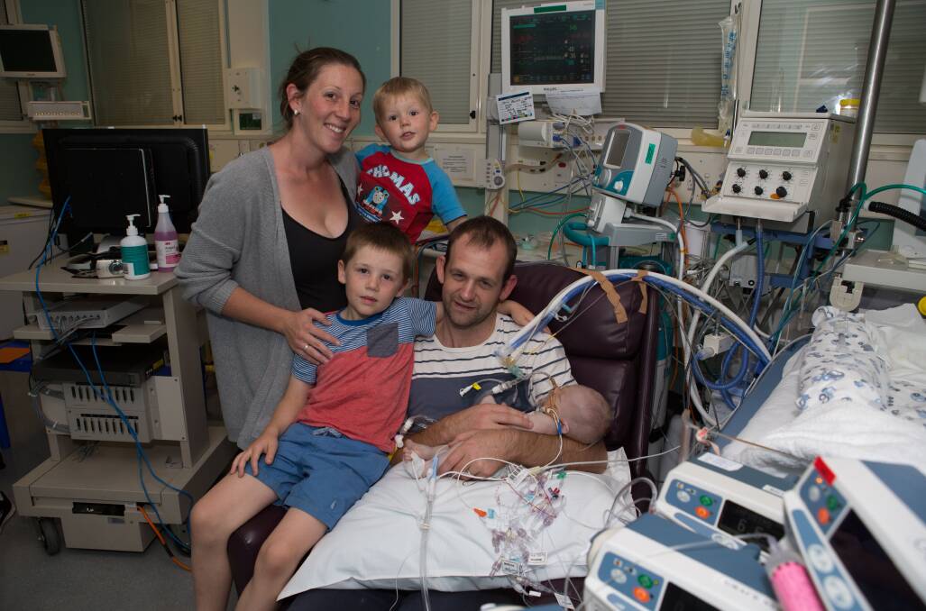 MAKING A DIFFERENCE: Nicole and Carl Baldry with their two sons, Angus, 8, and George, 4, and baby Henry last year. Picture: Supplied