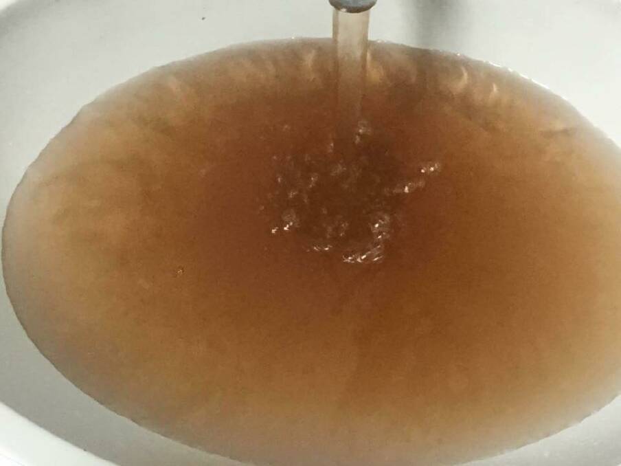 One resident's brown tap water in Junee late last year.  