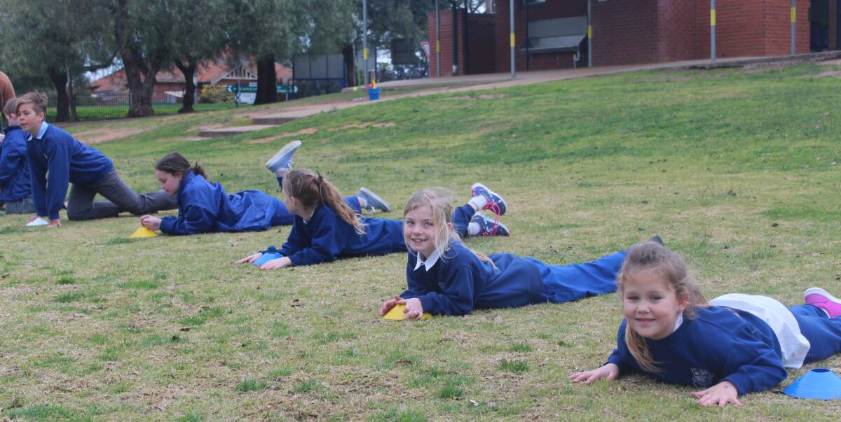 Students at Junee North Public School staying fit for a good cause on their annual Open Day. Picture: supplied