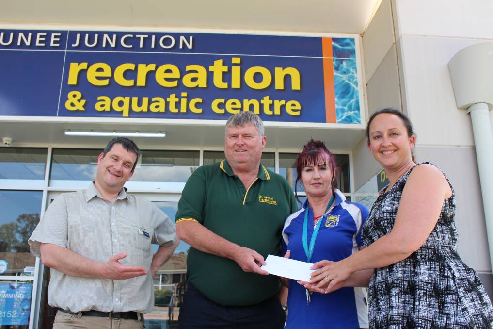 ACTION HEROES: Deputy Mayor Matt Austin, Graham Besley and Natalie Phillips from Junee Can Assist with Jennifer Read from JRAC. 