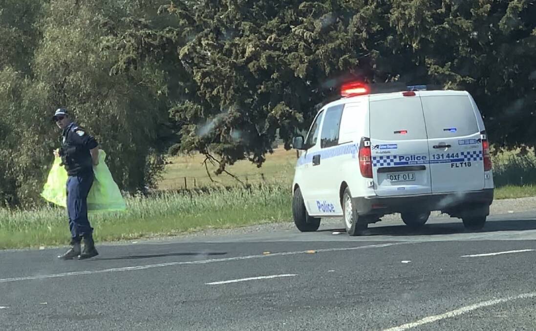TRAGEDY: NSW Police near the crash scene in Old Junee on Saturday. Picture: Jaydan Duck