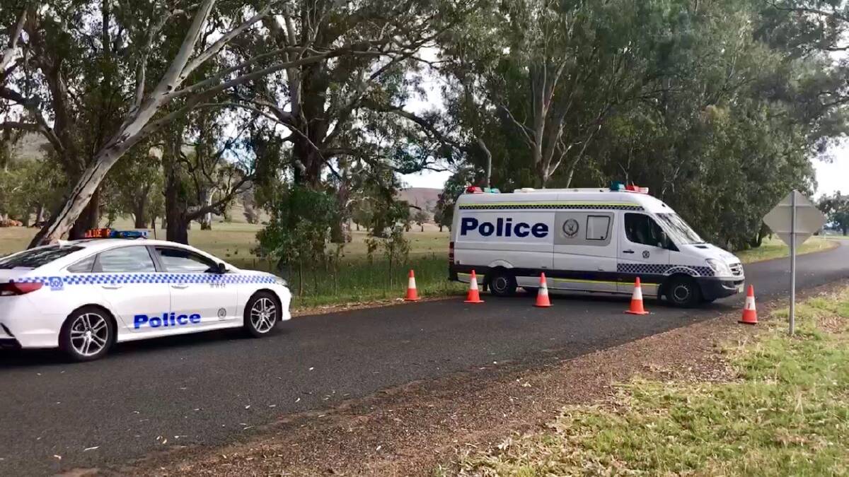 Police vehicles at the scene on River Road, about 40km east of Wagga. Picture: Connor McGoverne/9 News Riverina.