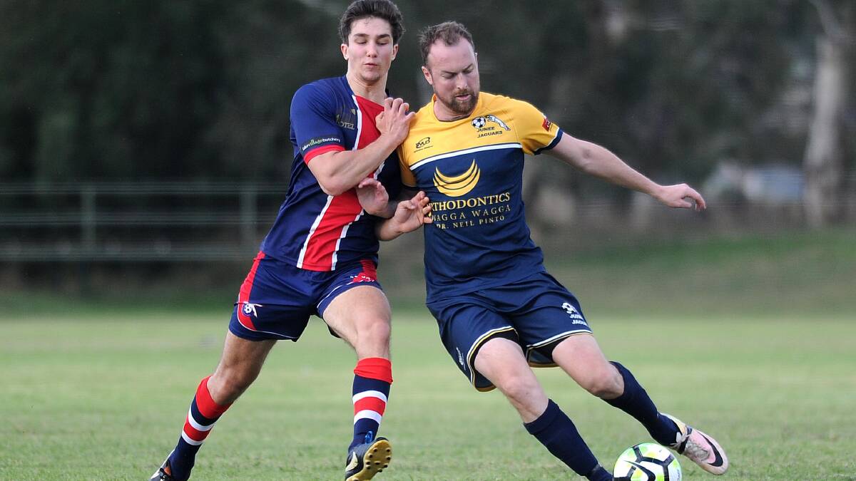 FORMER COLOURS: Lincoln Weir (right) in action for Junee against Henwood Park in 2017. 