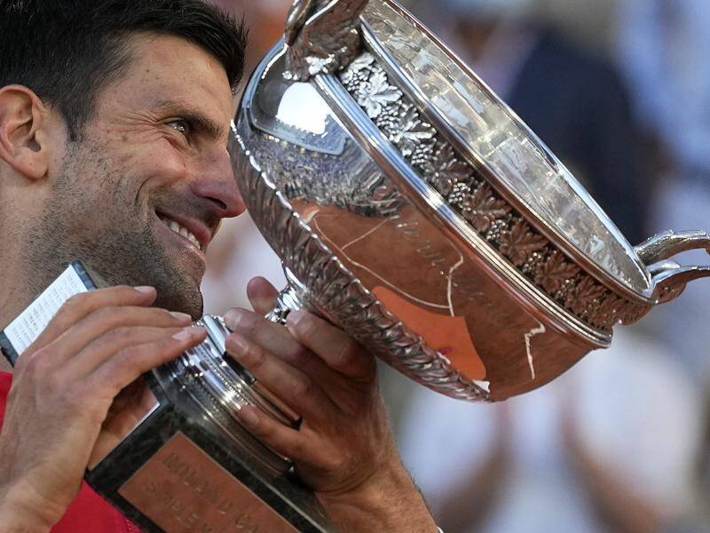 Novak Djokovic holds the French Open trophy for a second time after his great comeback win.