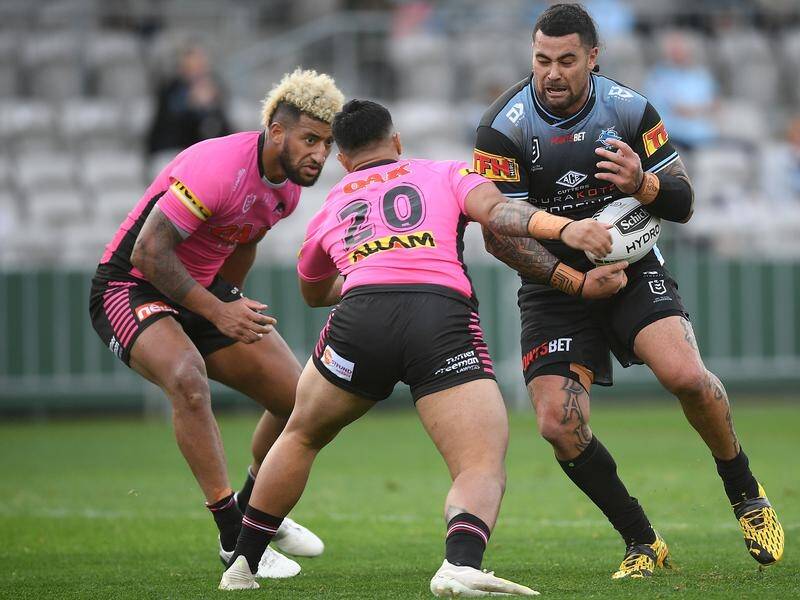 Cronulla's big NRL loss to Penrith has been soured further by an injury to prop Andrew Fifita (R).