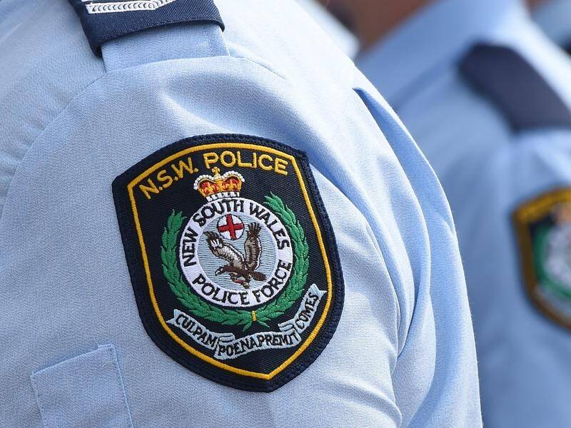 NSW Police have raided a Sydney home and arrested a 19-year-old after an assault near a rock pool.