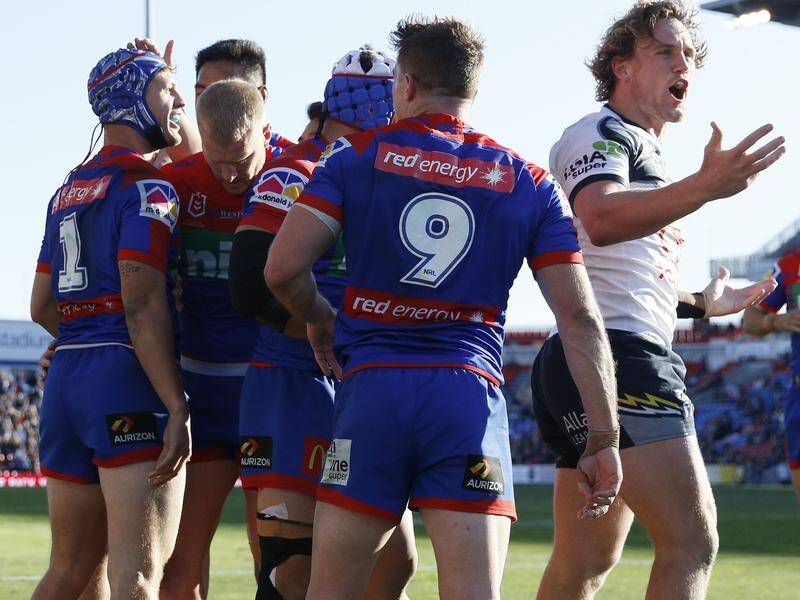 Kalyn Ponga (L) scored two tries in Newcastle's 42-6 round 22 win over North Queensland.
