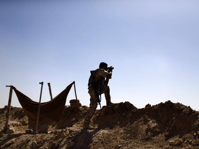 IS militants are said to have killed three villagers in Iraq's north and 10 Kurdish peshmerga troops