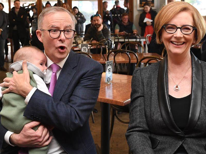Julia Gillard has urged Australian women to vote for Anthony Albanese and Labor on Saturday.