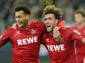 Cologne's Davie Selke (l) celebrates his match-winning goal with Luca Waldschmidt against Darmstadt. (AP PHOTO)