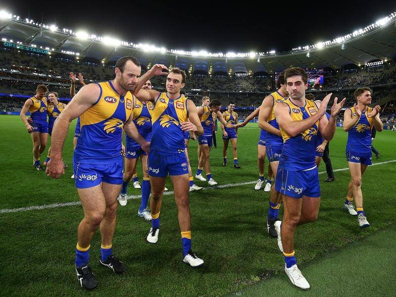 Shannon Hurn, Luke Edwards and Andrew Gaff celebrate after the Eagles win over Richmond.