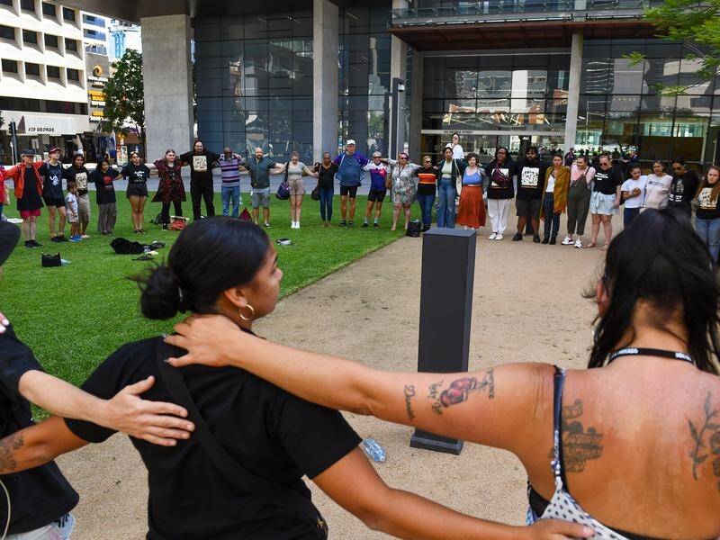 A Brisbane courthouse was locked down amid protests over a police shooting death west of Cairns. (Jono Searle/AAP PHOTOS)