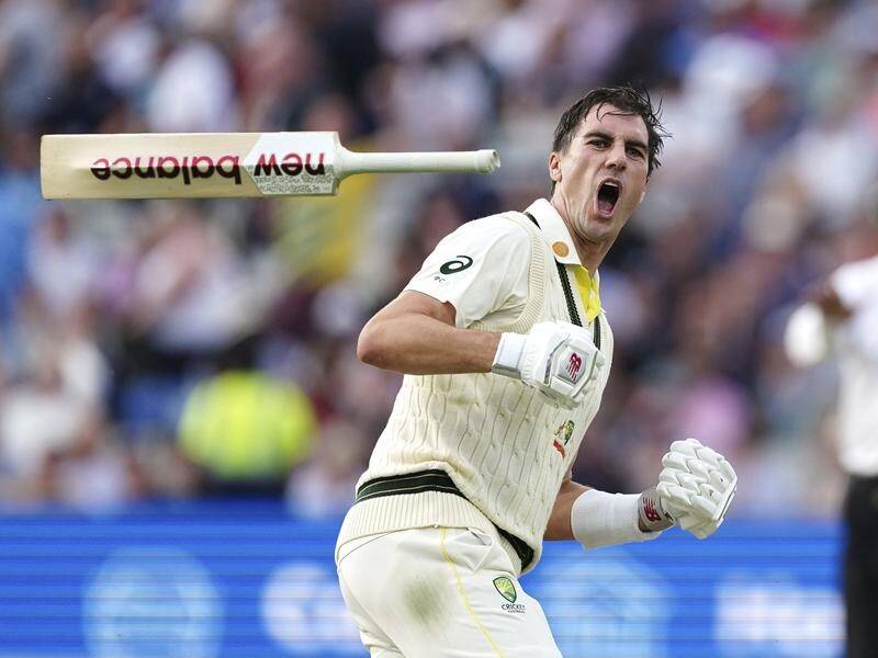 Pat Cummins hurls his bat joyously after guiding Australia to an epic triumph at Edgbaston. (AP PHOTO)